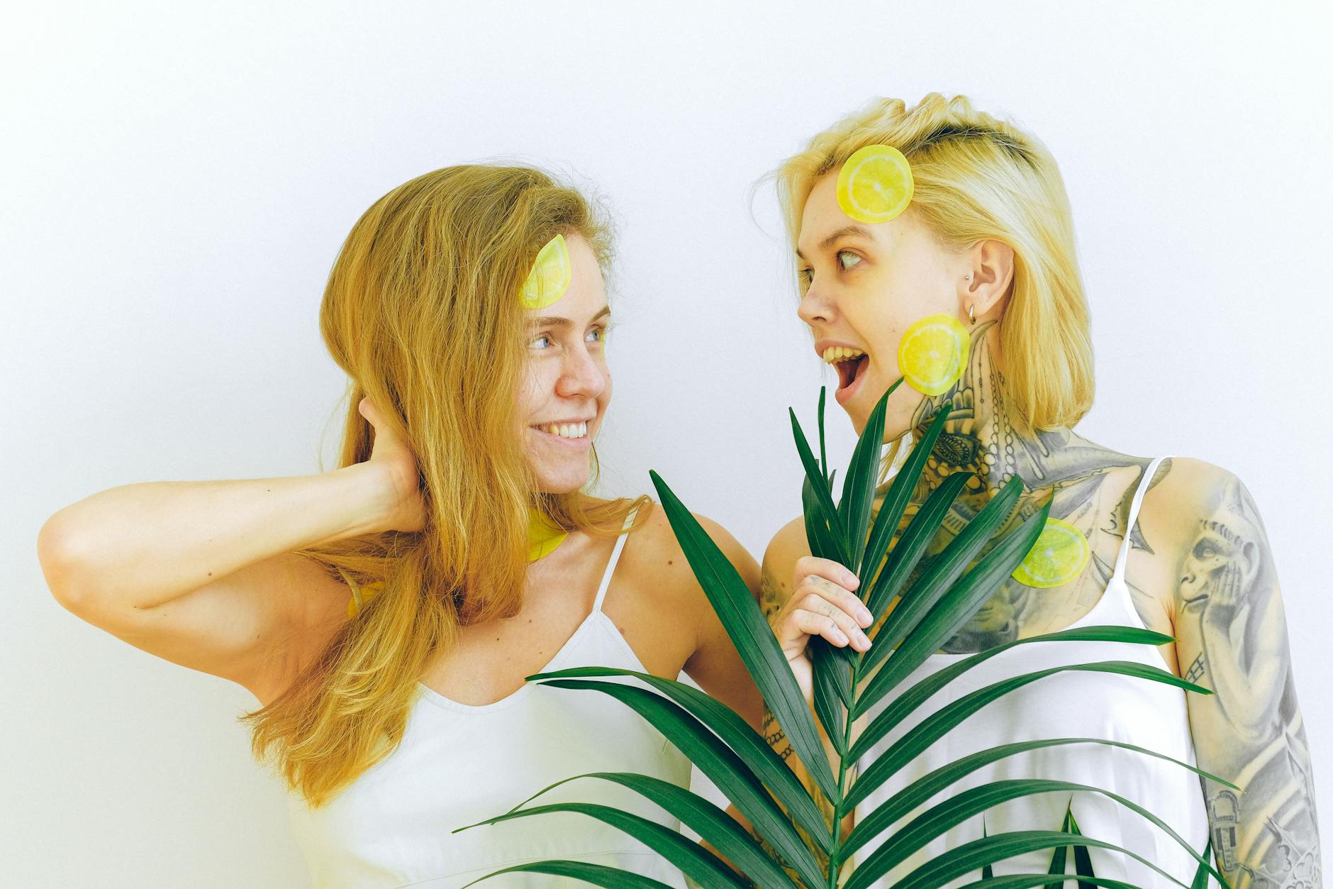 Two people laughing together while exploring intimacy with openness and joy